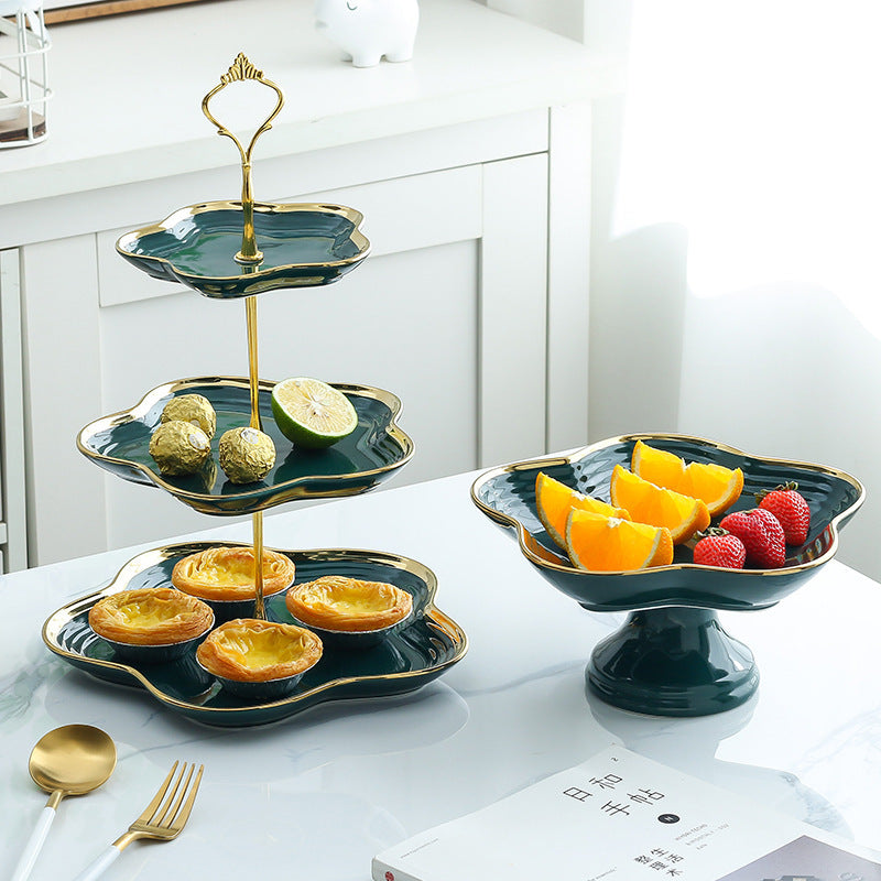Three-tier green ceramic cake and snack stand for tea parties or afternoon desserts