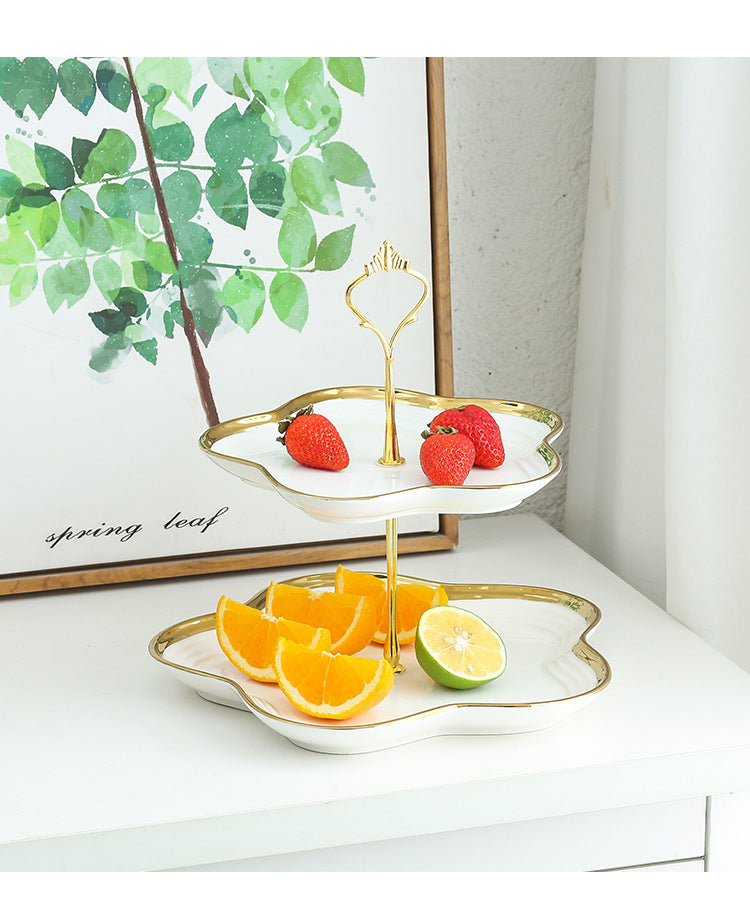 White ceramic two-tier fruit and snack plate for home tea table display